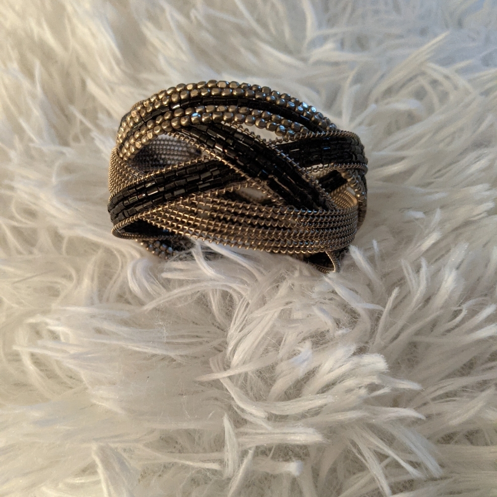 Black and silver braided bracelet.